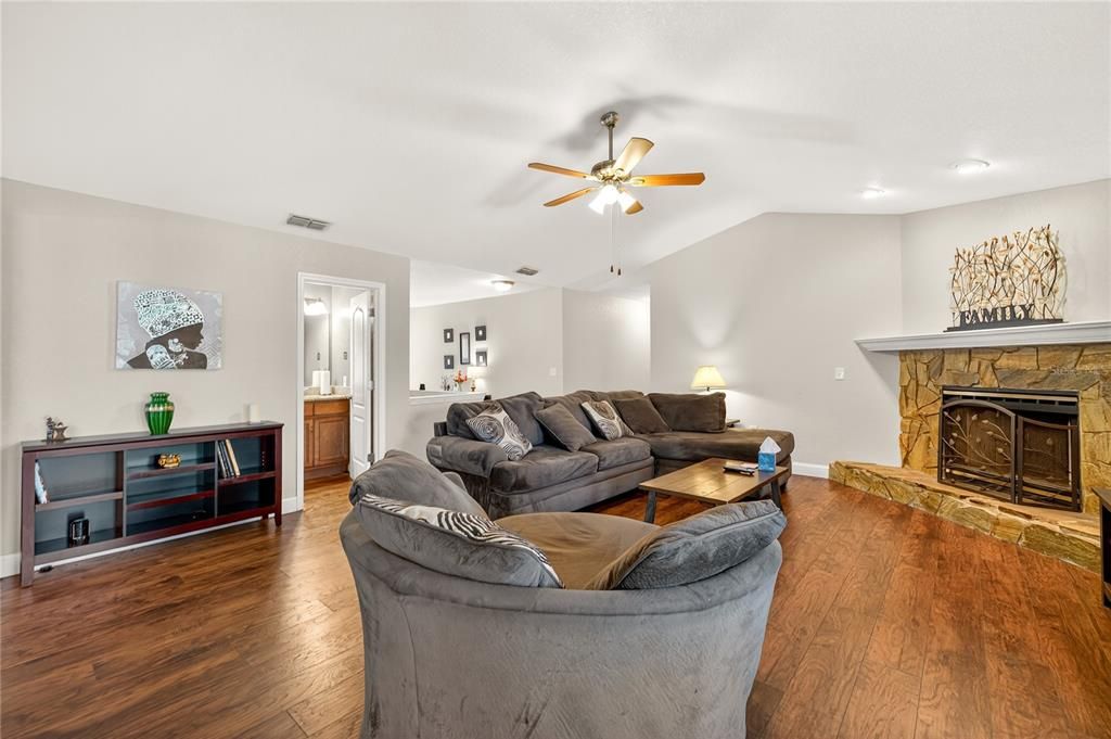 Fireplace, Interior, Living room, Recessed Lighting, Wood Texture Flooring