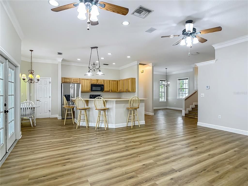 Chandelier, Interior, Kitchen, Pendant Lights, Recessed Lighting, Stainless Steel Appliances, Wood Texture Flooring