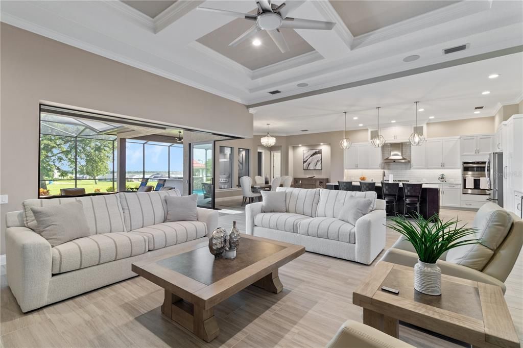 Dining room, Interior, Kitchen, Living room, Pendant Lights, Recessed Lighting, Stainless Steel Appliances, Wood Texture Flooring