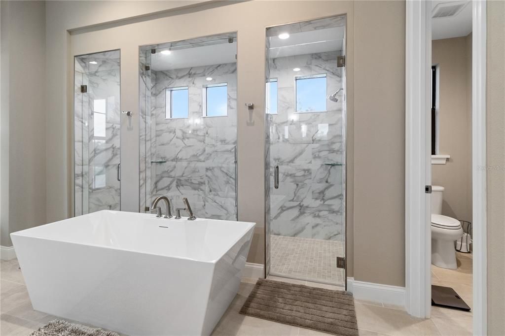 Bathroom, Free Standing Baths, Glass Shower, Interior, Marble, Marble Walls, Recessed Lighting