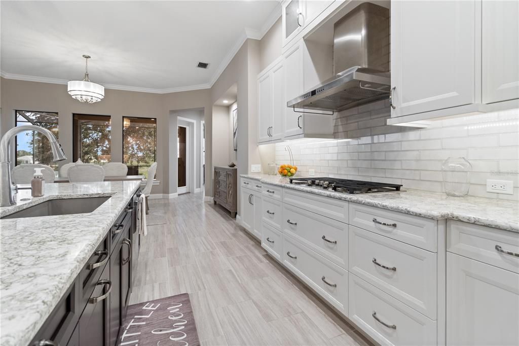 Chandelier, Interior, Kitchen, Recessed Lighting, Stainless Steel Appliances, Wood Texture Flooring