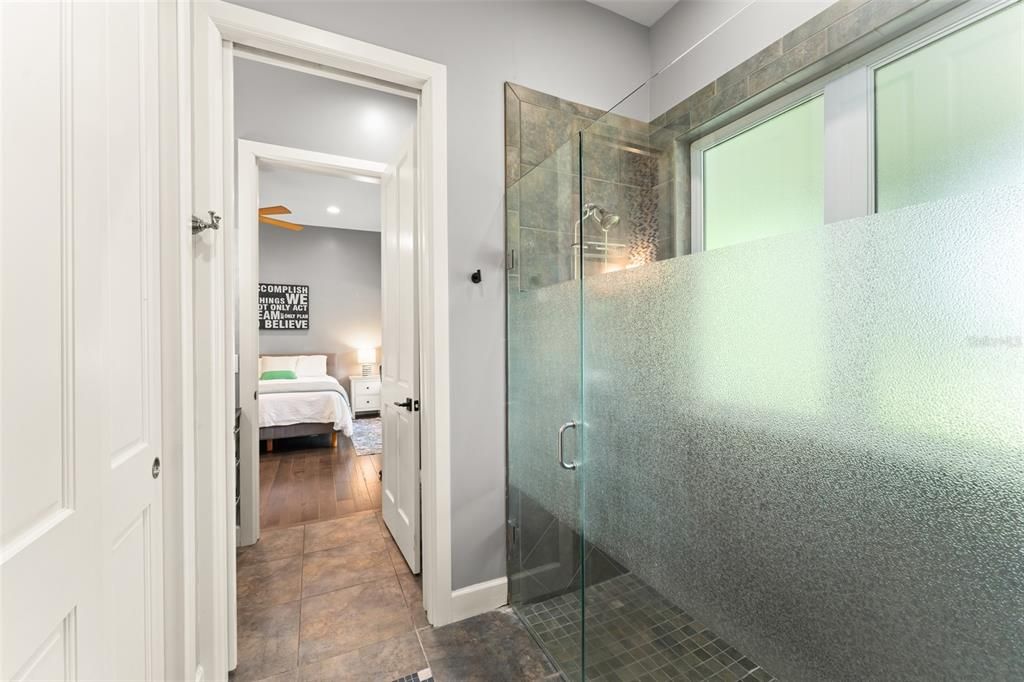 Bathroom, Bedroom, Glass Shower, Interior, Recessed Lighting, Wood Texture Flooring