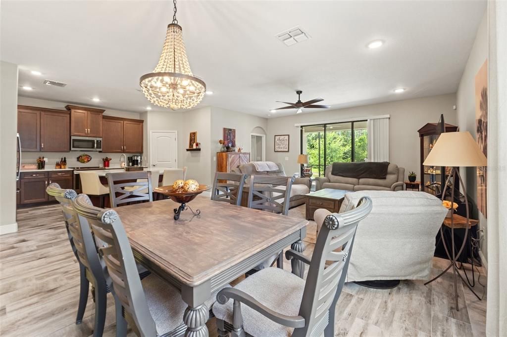 Chandelier, Dining room, Interior, Kitchen, Living room, Pendant Lights, Recessed Lighting, Wood Texture Flooring
