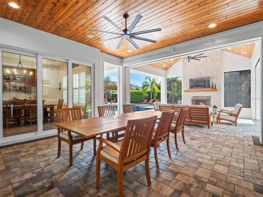 Dining room, Fireplace, Interior, Recessed Lighting, Stone Walls, Wooden Ceilings