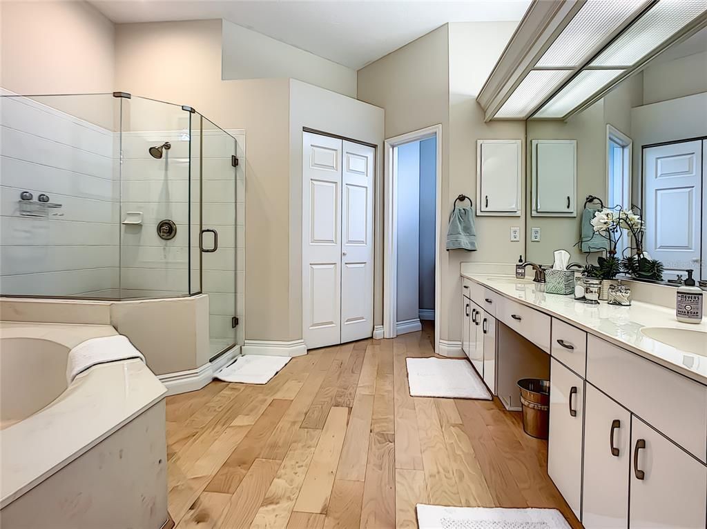 Bathroom, Dual Sink Vanities, Glass Shower, Interior, Wood Texture Flooring