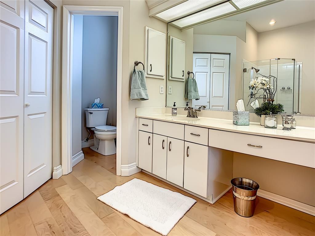 Bathroom, Dual Sink Vanities, Glass Shower, Interior, Recessed Lighting, Wood Texture Flooring