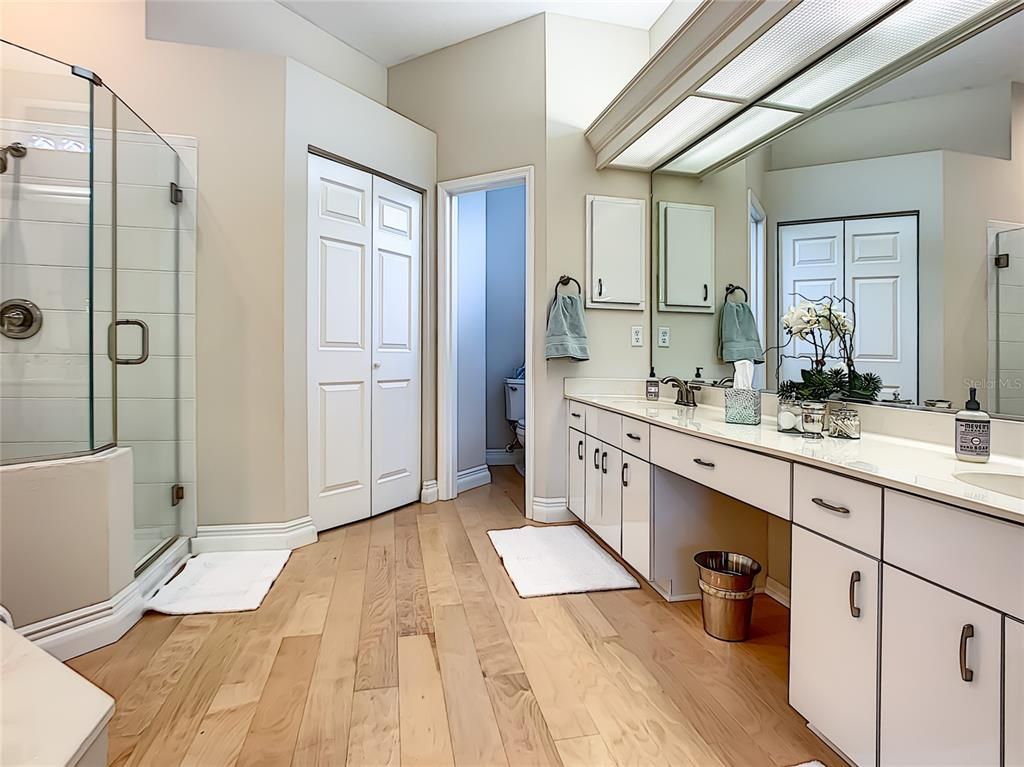 Bathroom, Dual Sink Vanities, Glass Shower, Interior, Wood Texture Flooring