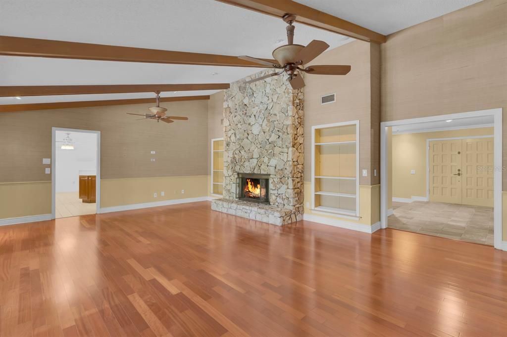 Empty room, Fireplace, Interior, Recessed Lighting, Wooden Beams, Wood Texture Flooring