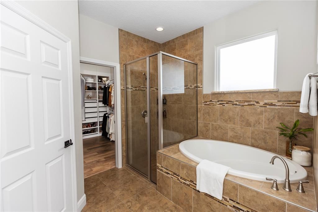 Bathroom, Glass Shower, Interior, Recessed Lighting, Walk-in Closets, Wood Texture Flooring