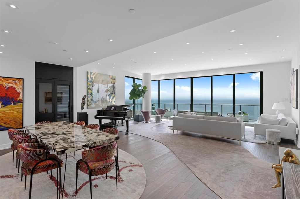 Dining room, Interior, Living room, Piano, Recessed Lighting, Water, Wood Texture Flooring