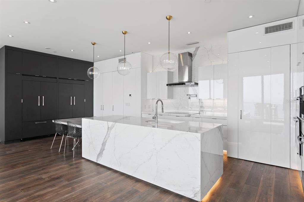 Interior, Kitchen, Marble Walls, Pendant Lights, Recessed Lighting, Wood Texture Flooring