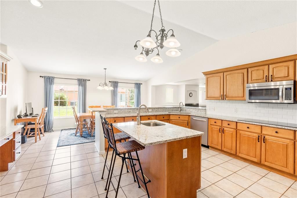 Chandelier, Dining room, Interior, Kitchen, Pendant Lights, Recessed Lighting, Stainless Steel Appliances