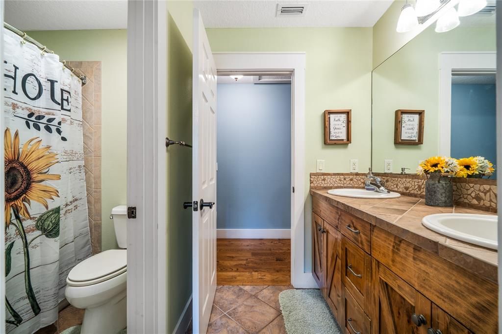 Bathroom, Dual Sink Vanities, Interior, Tile Countertops, Wood Texture Flooring