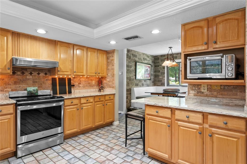 Interior, Kitchen, Pendant Lights, Recessed Lighting, Stainless Steel Appliances, Stone Walls