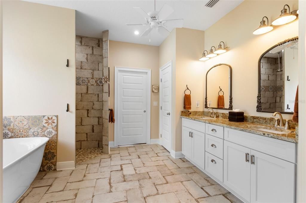 Bathroom, Dual Sink Vanities, Free Standing Baths, Interior, Recessed Lighting, Stone Walls