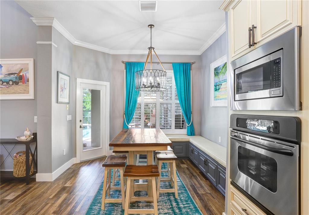 Dining room, Interior, Kitchen, Pendant Lights, Stainless Steel Appliances, Wood Texture Flooring