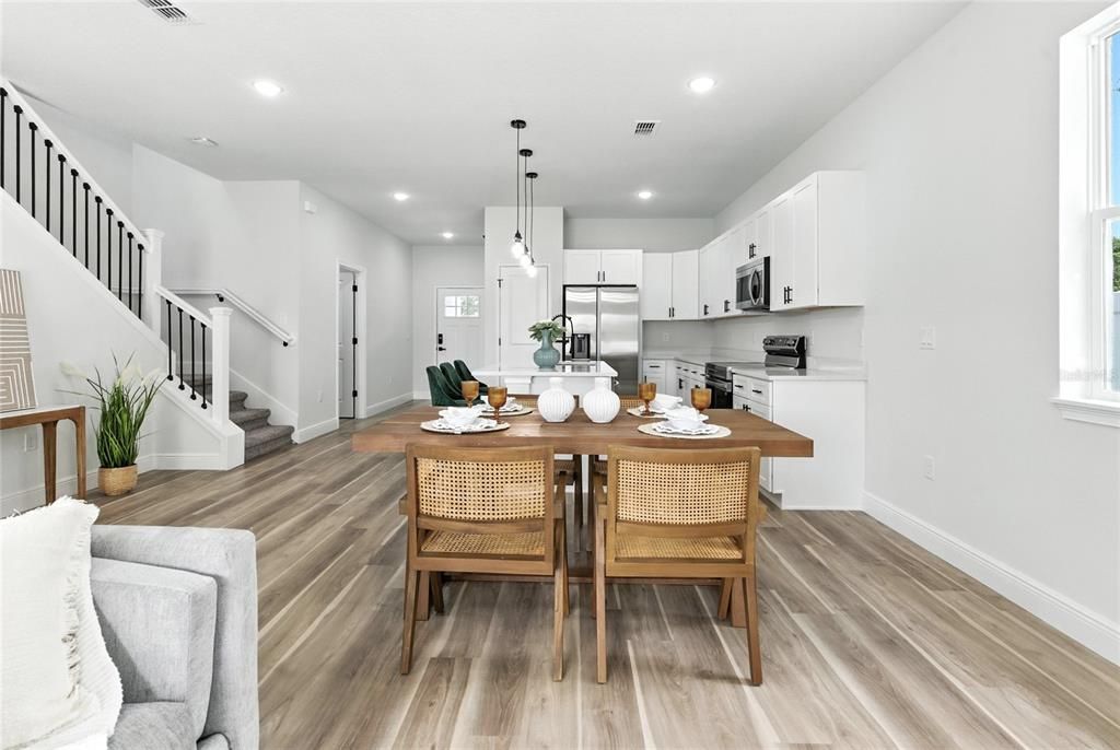 Dining room, Interior, Kitchen, Pendant Lights, Recessed Lighting, Stainless Steel Appliances, Wood Texture Flooring