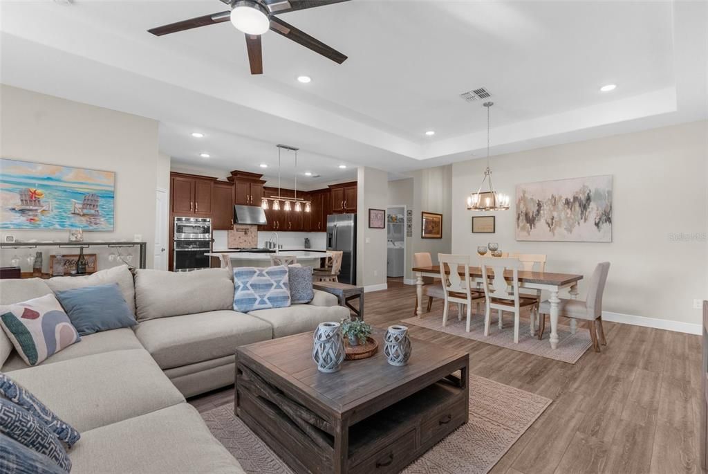 Dining room, Interior, Kitchen, Living room, Pendant Lights, Recessed Lighting, Stainless Steel Appliances, Wood Texture Flooring