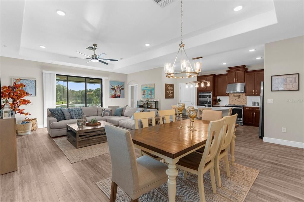 Dining room, Interior, Kitchen, Living room, Pendant Lights, Recessed Lighting, Stainless Steel Appliances, Wood Texture Flooring