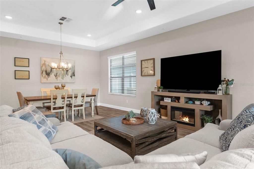 Chandelier, Dining room, Fireplace, Interior, Living room, Recessed Lighting, Wood Texture Flooring