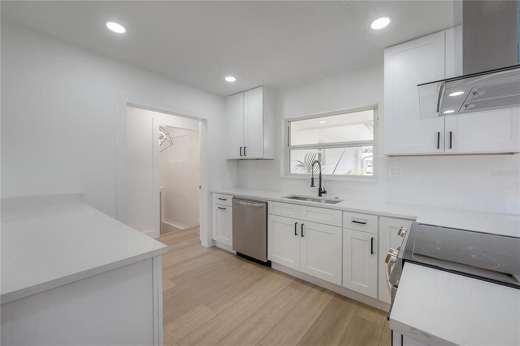 Interior, Kitchen, Recessed Lighting, Stainless Steel Appliances, Wood Texture Flooring