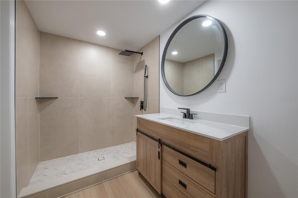Bathroom, Dual Sink Vanities, Interior, Recessed Lighting, Wood Texture Flooring