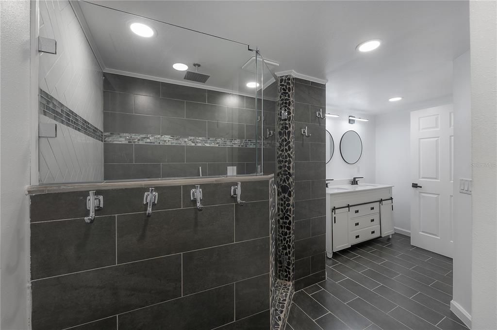 Bathroom, Dual Sink Vanities, Glass Shower, Interior, Recessed Lighting, Wood Texture Flooring