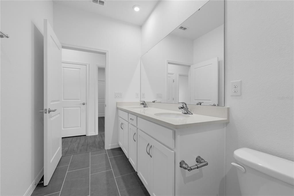Bathroom, Dual Sink Vanities, Interior, Recessed Lighting, Wood Texture Flooring