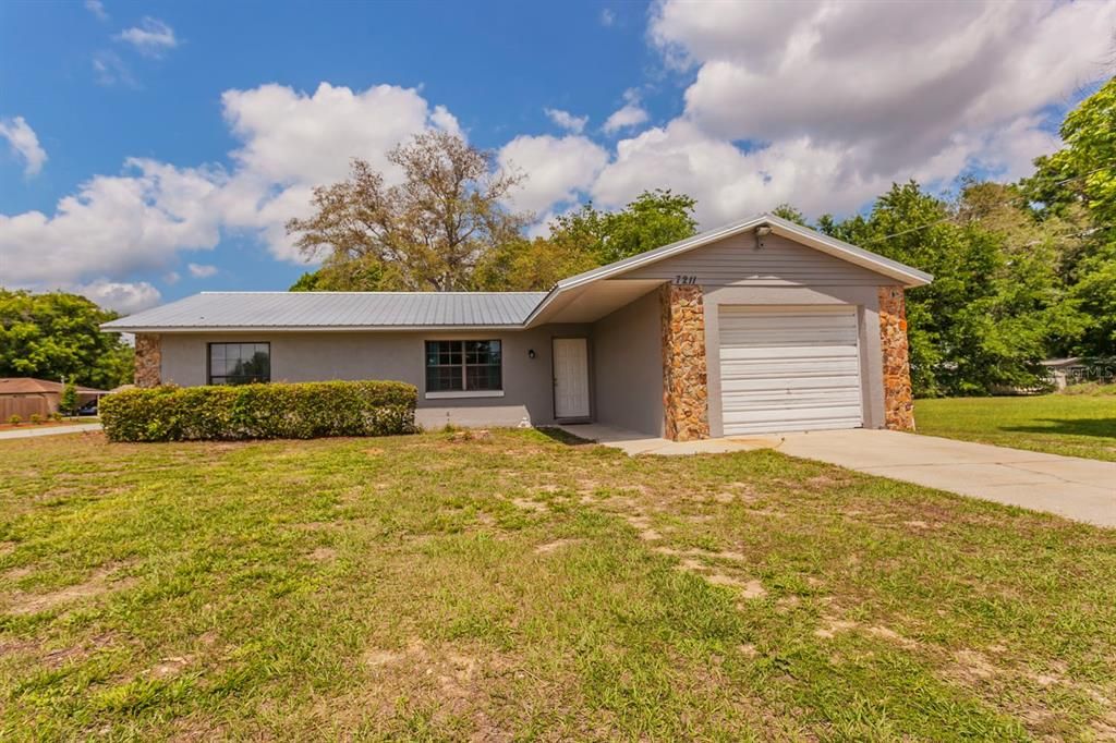 Attached, Backyard, Exterior, Facade, Brick Facade, Ranch