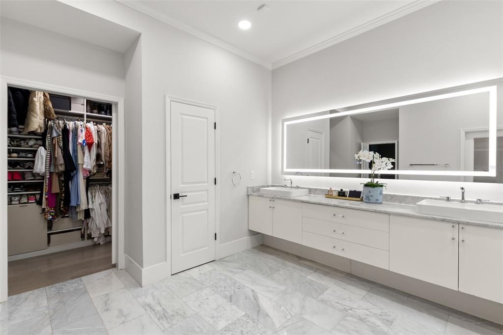 Bathroom, Dual Sink Vanities, Interior, Marble, Recessed Lighting, Walk-in Closets