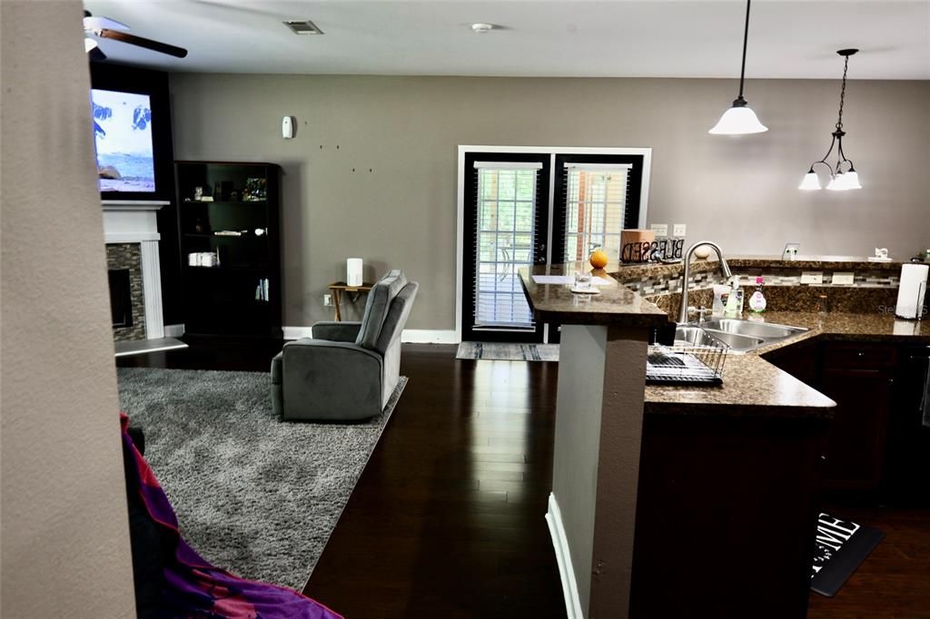 Fireplace, Interior, Kitchen, Pendant Lights, Wood Texture Flooring
