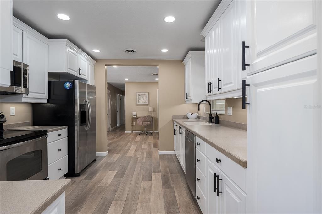 Interior, Kitchen, Recessed Lighting, Stainless Steel Appliances, Wood Texture Flooring
