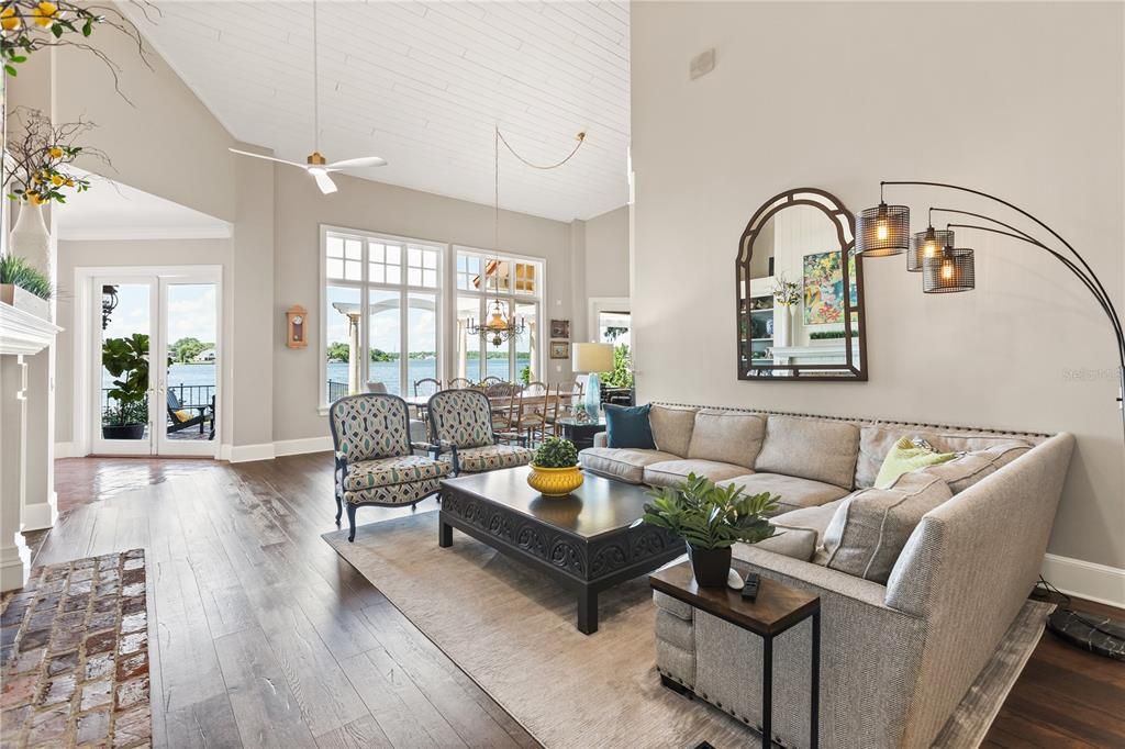 Chandelier, Dining room, Fireplace, Interior, Living room, Pendant Lights, Water, Wood Texture Flooring