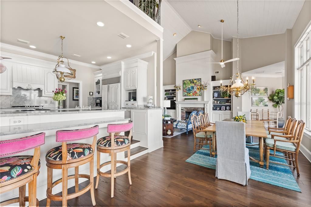 Chandelier, Dining room, Fireplace, Interior, Kitchen, Pendant Lights, Recessed Lighting, Stainless Steel Appliances, Wood Texture Flooring