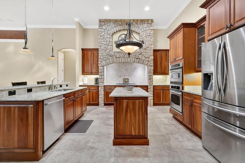 Interior, Kitchen, Pendant Lights, Recessed Lighting, Stainless Steel Appliances, Stone Walls