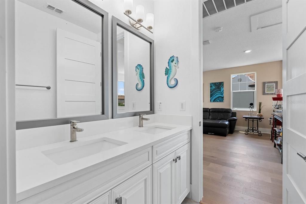 Bathroom, Dual Sink Vanities, Interior, Recessed Lighting, Wood Texture Flooring