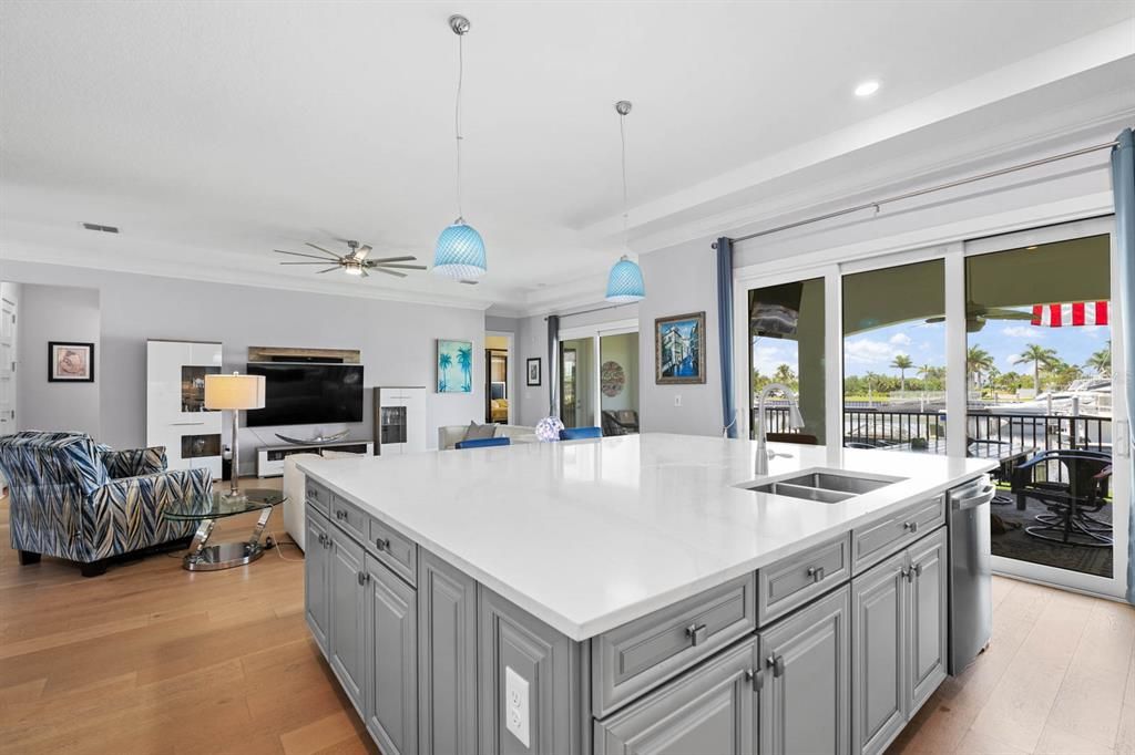 Dining room, Interior, Kitchen, Living room, Pendant Lights, Recessed Lighting, Water, Wood Texture Flooring