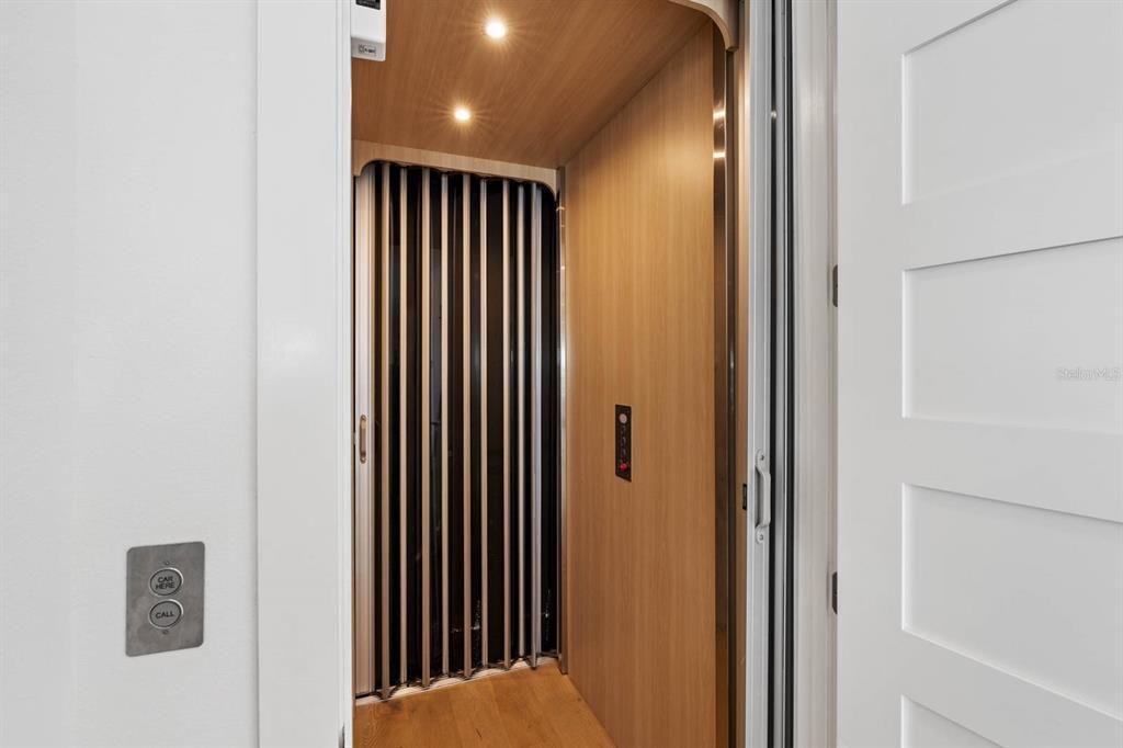 Elevator, Interior, Recessed Lighting, Wooden Ceilings, Wood Texture Flooring, Wooden Walls