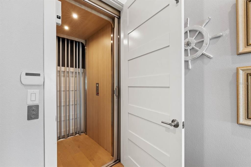 Elevator, Interior, Recessed Lighting, Wooden Ceilings, Wood Texture Flooring, Wooden Walls