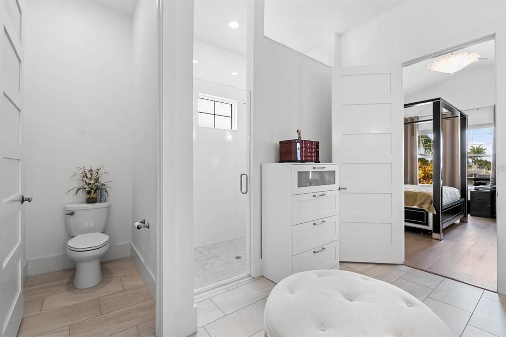 Bathroom, Bedroom, Glass Shower, Interior, Recessed Lighting, Wood Texture Flooring
