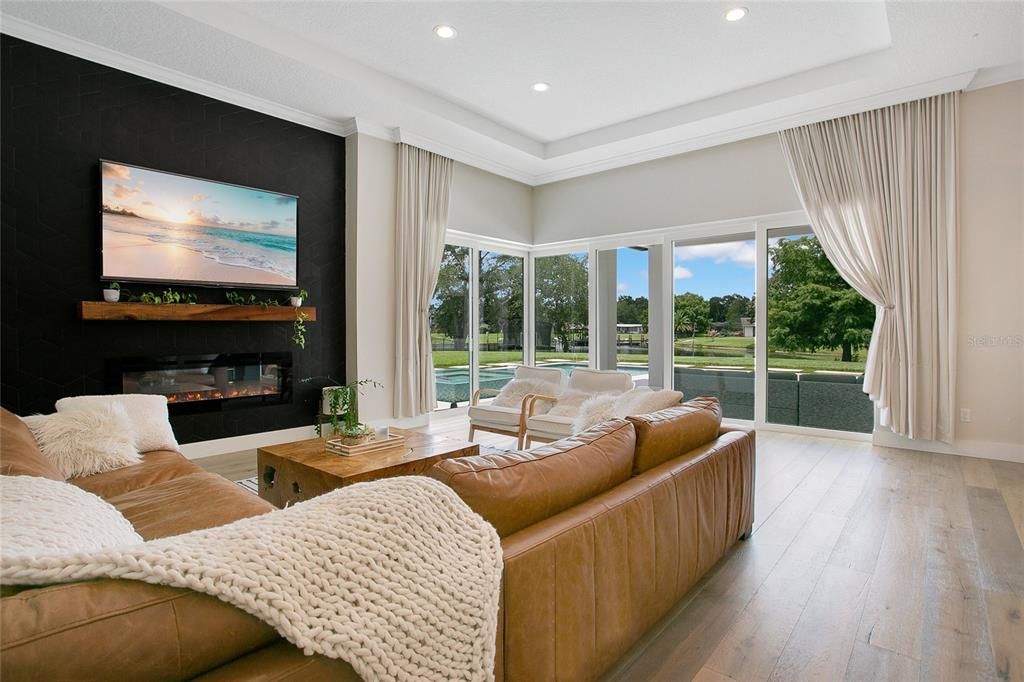 Fireplace, Interior, Living room, Recessed Lighting, Wood Texture Flooring