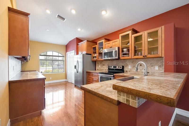 Interior, Kitchen, Recessed Lighting, Stainless Steel Appliances, Wood Texture Flooring