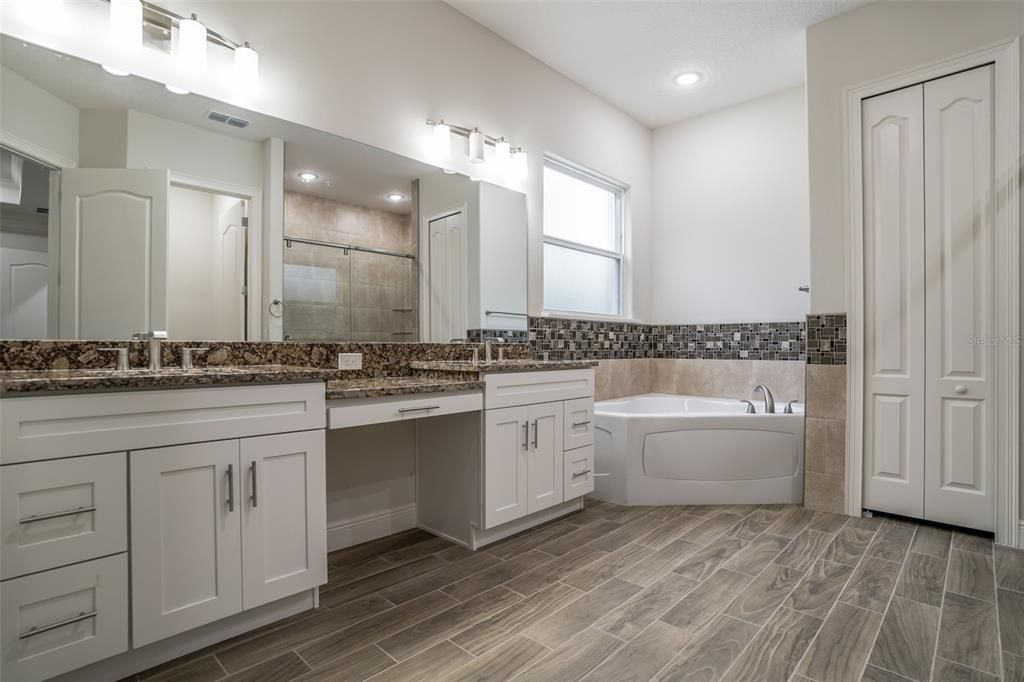 Bathroom, Dual Sink Vanities, Interior, Recessed Lighting, Wood Texture Flooring