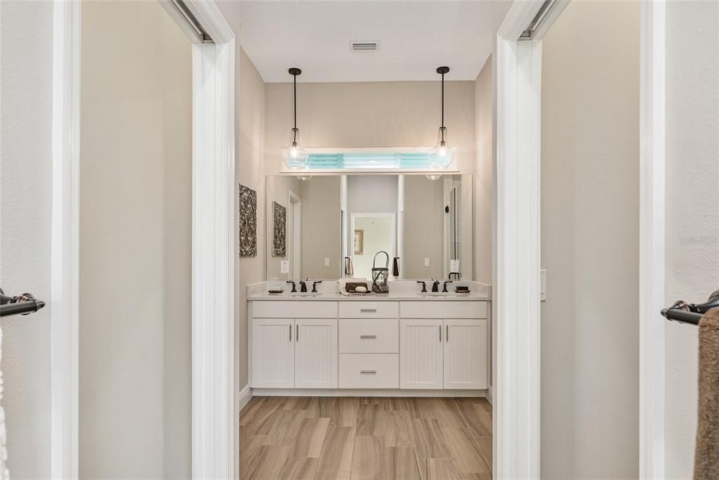 Bathroom, Dual Sink Vanities, Interior, Pendant Lights, Wood Texture Flooring