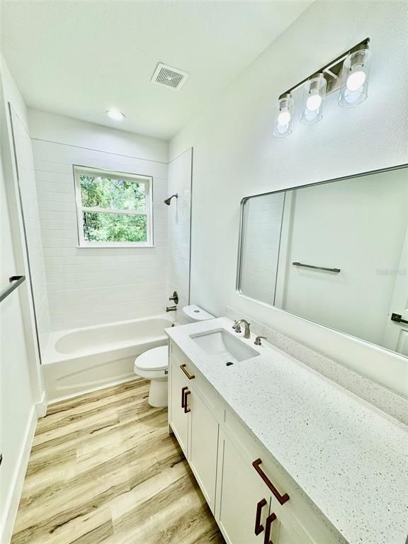 Bathroom, Dual Sink Vanities, Interior, Recessed Lighting, Wood Texture Flooring