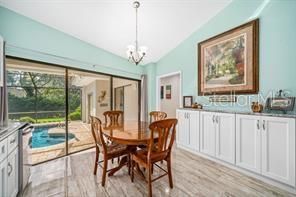 Chandelier, Dining room, Interior, Pendant Lights, Pool, Wood Texture Flooring