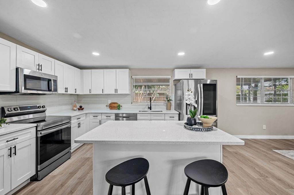 Interior, Kitchen, Recessed Lighting, Stainless Steel Appliances, Wood Texture Flooring