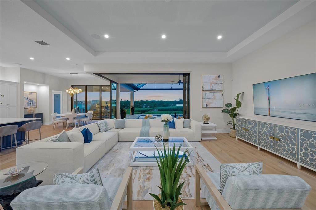 Chandelier, Dining room, Interior, Living room, Recessed Lighting, Water, Wood Texture Flooring