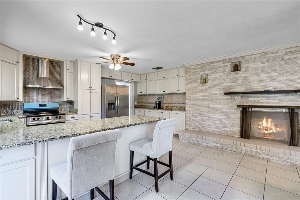 Fireplace, Interior, Kitchen, Stainless Steel Appliances, Stone Walls