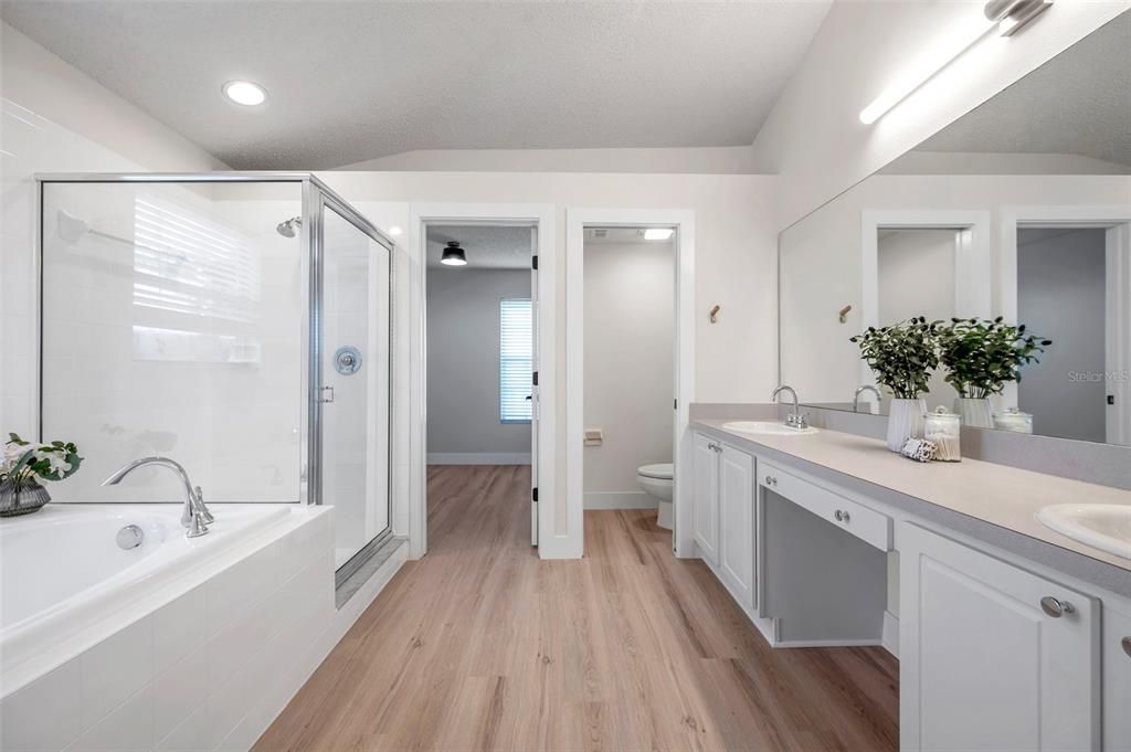 Bathroom, Dual Sink Vanities, Glass Shower, Interior, Recessed Lighting, Wood Texture Flooring